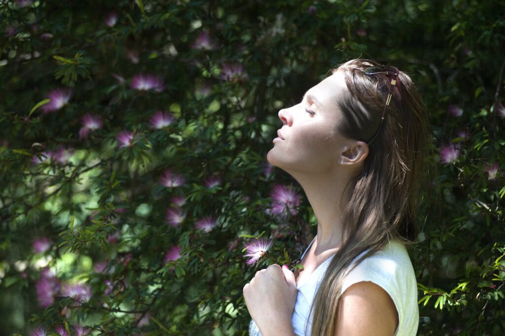 Woman smelling Edible Flowers for Mindfulness