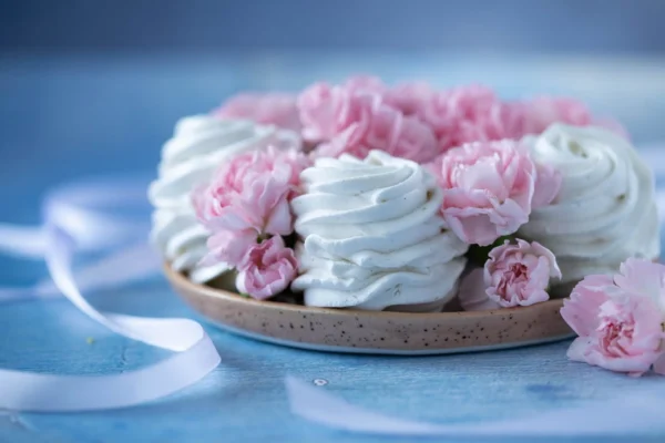 Chrysanthemum Marshmallow Swirls on a wooden plate